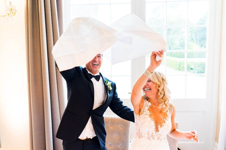Bride and groom during the wedding breakfast at Rushton Hall Photography