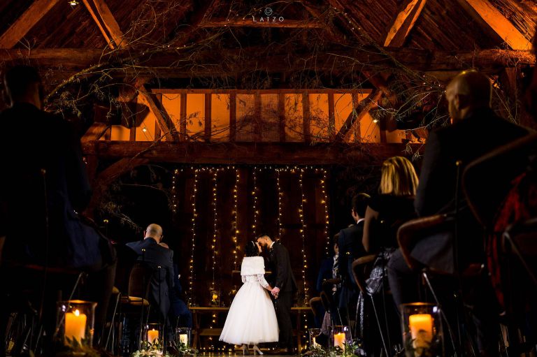 first kiss as wife and a husband at Tythe Barns Wedding 