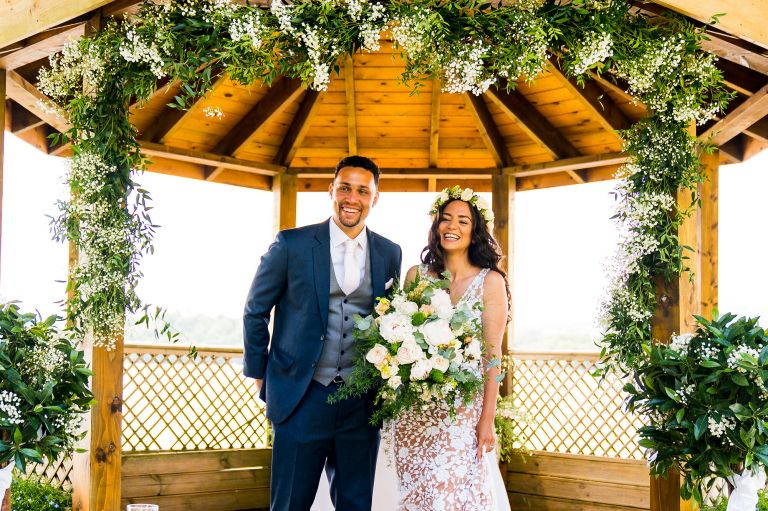 Just married couple laughing after ceremony at lake district wedding