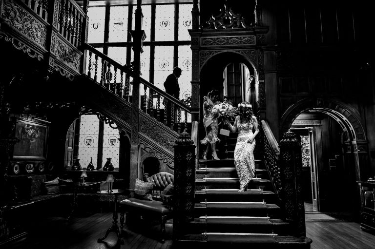 Langdale Chase at Lake District bride coming down the stairs